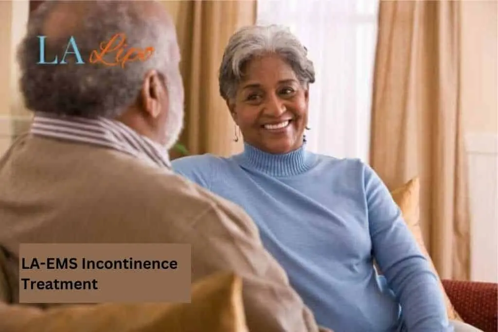 Couple sat smiling at each other - LA-EMS treatment Lyndhurst