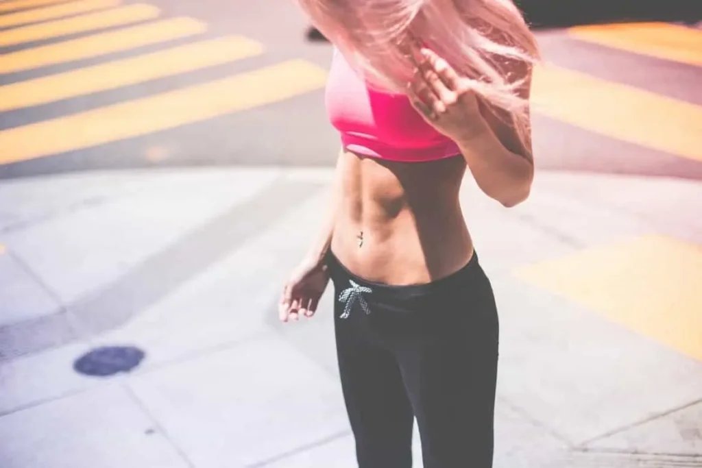 Woman with toned stomach after LA-EMS Body Sculpting Treatment Lyndhurst